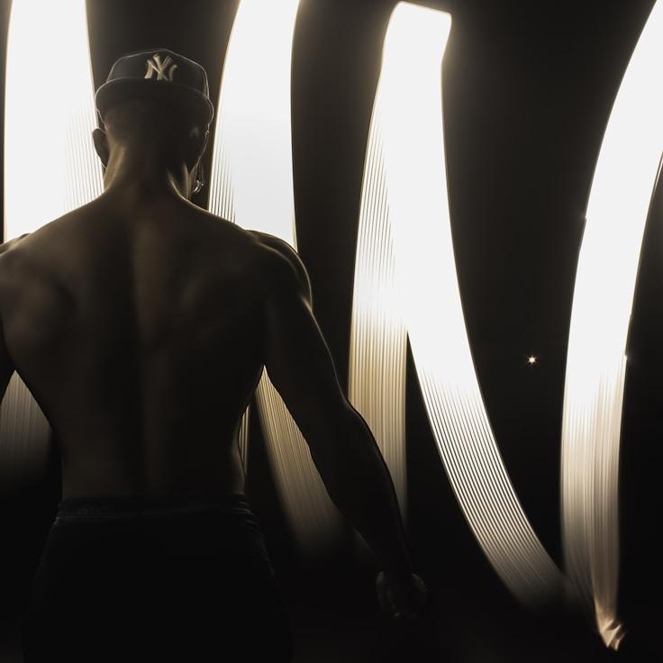 Interior of a professional gym with weight training equipment and mirrors